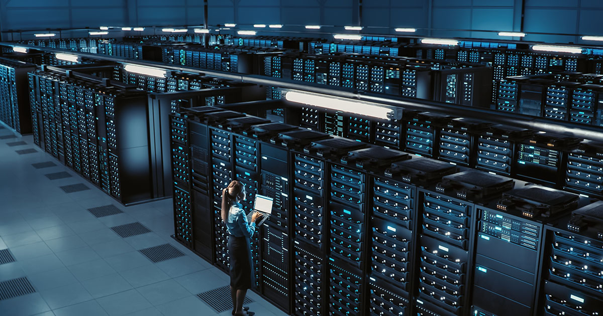 Rows of servers in a data center with network cables